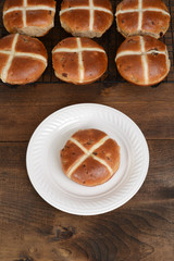 top view hot cross bun on plate