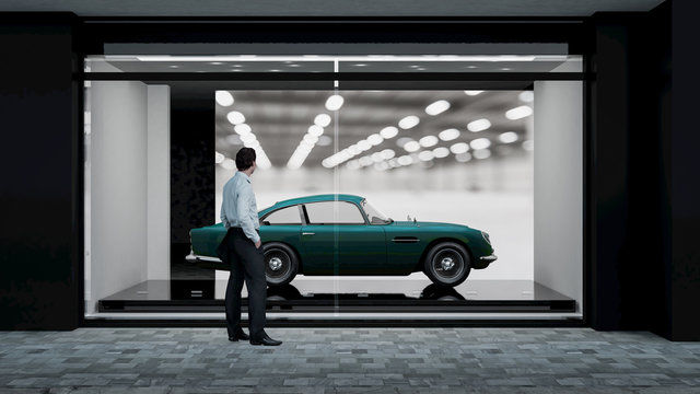 Schaufenster mit klassischem Automobil und Besucher