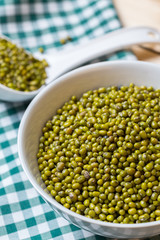 Green bean seed on table.