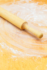 Wooden rolling pin on kitchen