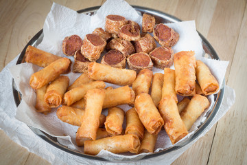 Deep fried spring rolls and deep fried chicken rolls