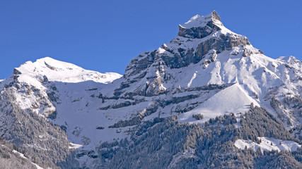 Beautiful Winter Scenery with view of spectacular Hahnen-Mountain, Engelberg Valley, Switzerland
