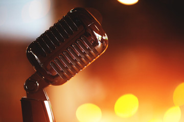 Microphone on a stage with concert light