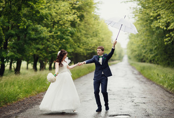 Happy couple ignore rain