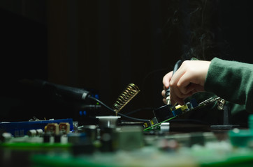 Repair of electronic devices, tin soldering parts. solderer