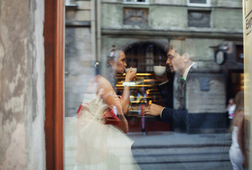 Couple in restaurant drinking coffee