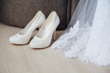 beautiful wedding dress and shoes