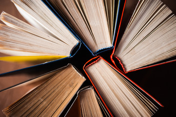 Old books on wooden table, top view. World Book Day poster