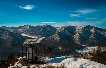 The anemometer on top of the mountain with a magnificent view background