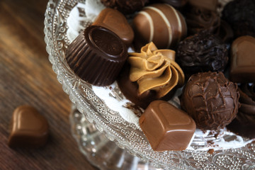 fine chocolate and nougat pralines, round and heart shape on an etagere