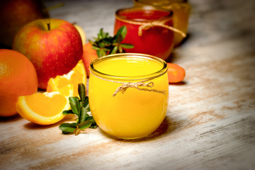 Healthy fresh orange juice on rustic table