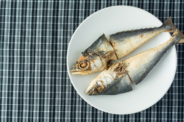 Fried Salted Fish on white dish.