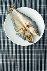 Fried Salted Fish on white dish.