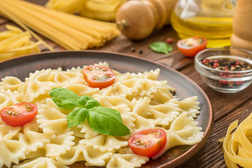 Ready to eat farfalle with cut tomatoes and basil