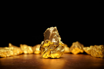 Closeup of big gold nugget - obrazy, fototapety, plakaty