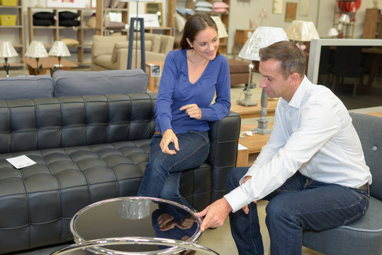 Couple in furniture store