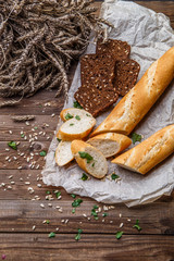 Baguette and bread with grain