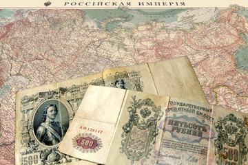 banknotes  tsarist russian empire/photography with scene of the banknotes to russian empire sample 1912 on background of the geographical card