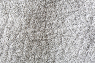 Texture of a synthetic blanket.