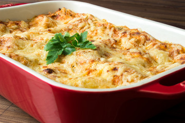 Homemade Meat lasagna on wooden table