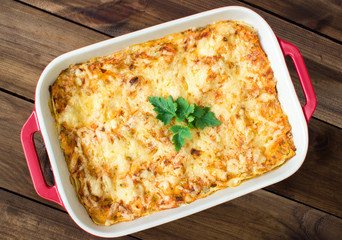 Homemade Meat lasagna on wooden table