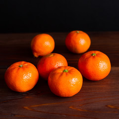 mandarin on dark wood