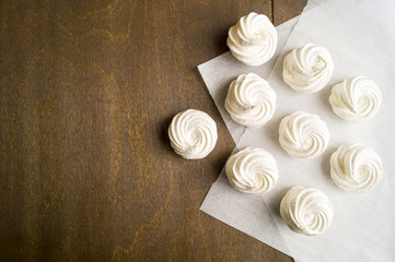 dessert meringue on wooden background