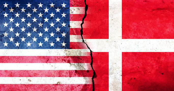 A large crack in the wall. USA flag. Flag of Denmark