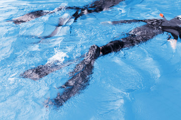 Free diving training on swimming pool