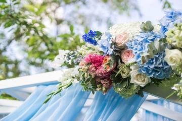 Wedding arch for the ceremony in the garden, fragment, close up