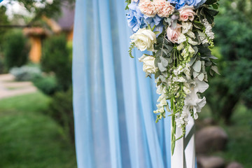 Wedding arch for the ceremony in the garden, fragment, close up