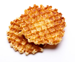 Freshly baked waffles isolated on white background. Top view.