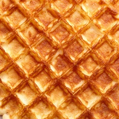 Freshly baked waffle texture. Top view.