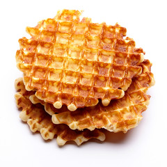 Freshly baked waffles isolated on white background. Top view.