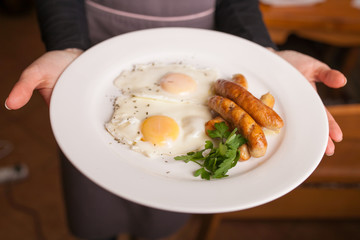 Fried eggs with sausage 