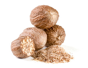 Three nutmeg and powder isolated on white background