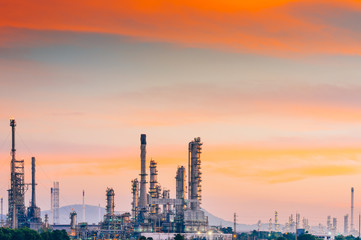 Fototapeta premium Industrial zone,The equipment of oil refining,Close-up of industrial pipelines of an oil-refinery plant,Detail of oil pipeline with valves in large oil refinery.