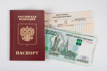 Passport, money and a train ticket, top view, white background