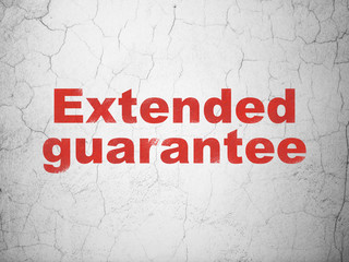 Insurance concept: Extended Guarantee on wall background