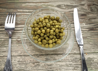 Canned green peas in plate