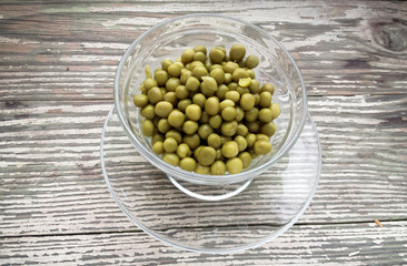 Canned green peas in plate