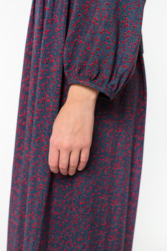 Details of women's clothing. Detail dress on a model on a white background