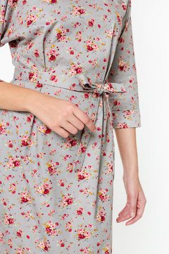 Details of women's clothing. Detail dress on a model on a white background