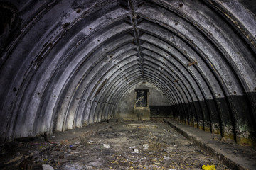 Fototapeta na wymiar Abandoned and rotten bunker in Soviet military base