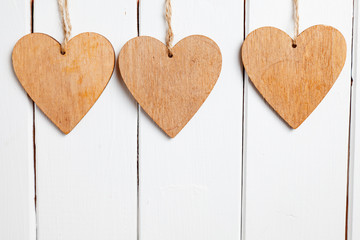 Valentines Day Decoration. Hearts On Wooden Background
