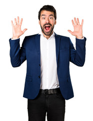 Handsome man making surprise gesture