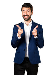 Handsome man pointing to the front