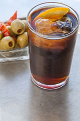 Vermouth, traditional Spanish appetizer with olives