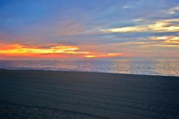 Pretty Pink Summer Sunrise at the Beach on a Summer Morning