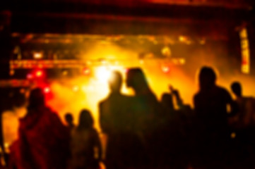 Couple in love at the concert. Defocus